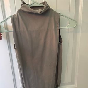 Skims grey sleeveless bodysuit, size L/XL. Never worn.